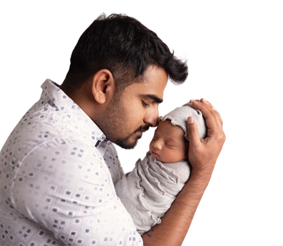 Father Holding New Born Baby